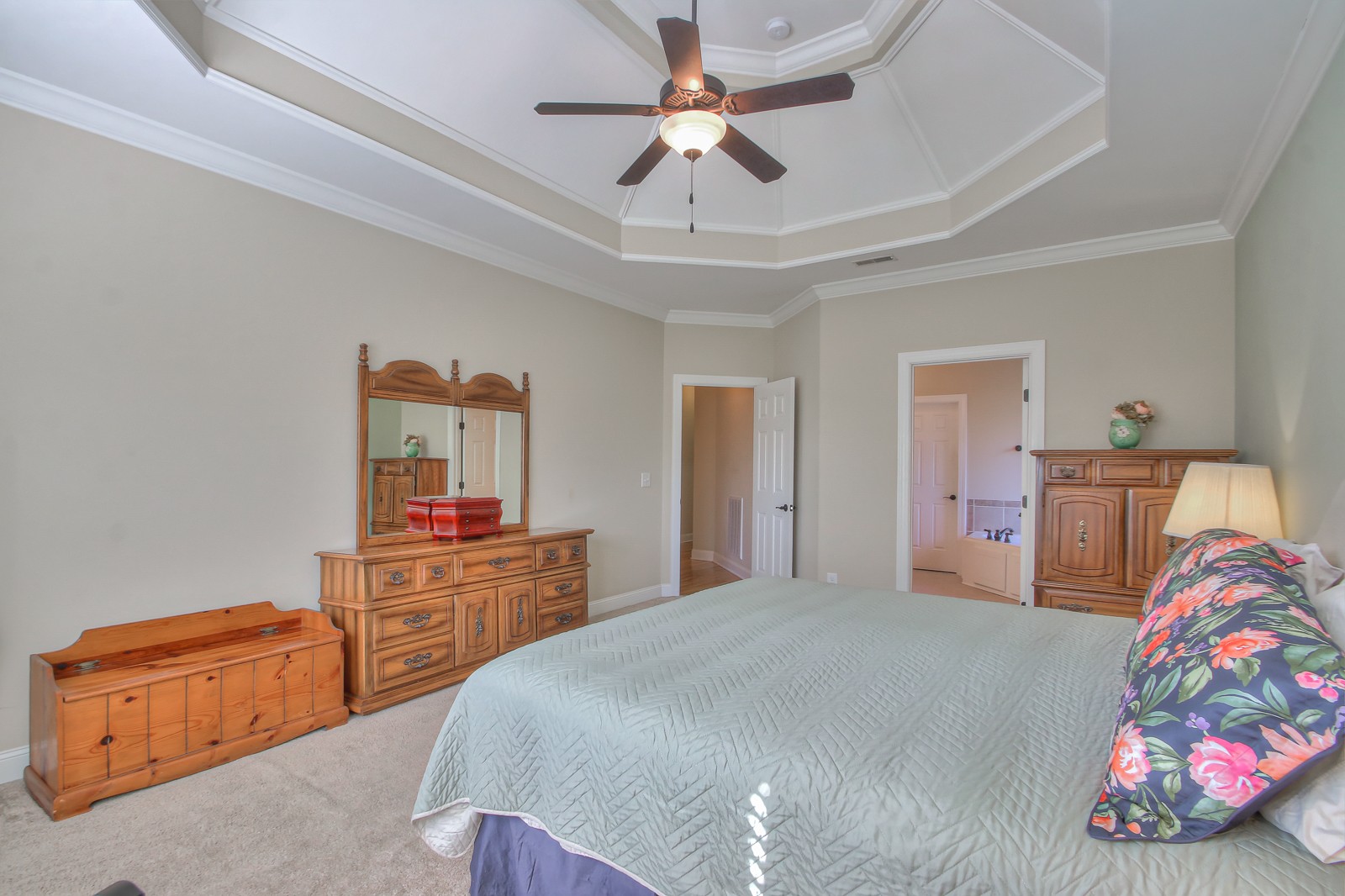 3028 Sakari Circle Spring Hill, TN 37174 - Photo 23 of 46 a bedroom with a bed and a chandelier