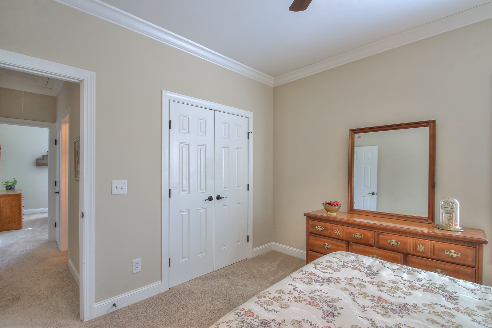 3028 Sakari Circle Spring Hill, TN 37174 - Photo 31 of 46 a bedroom with a bed and a dresser in it