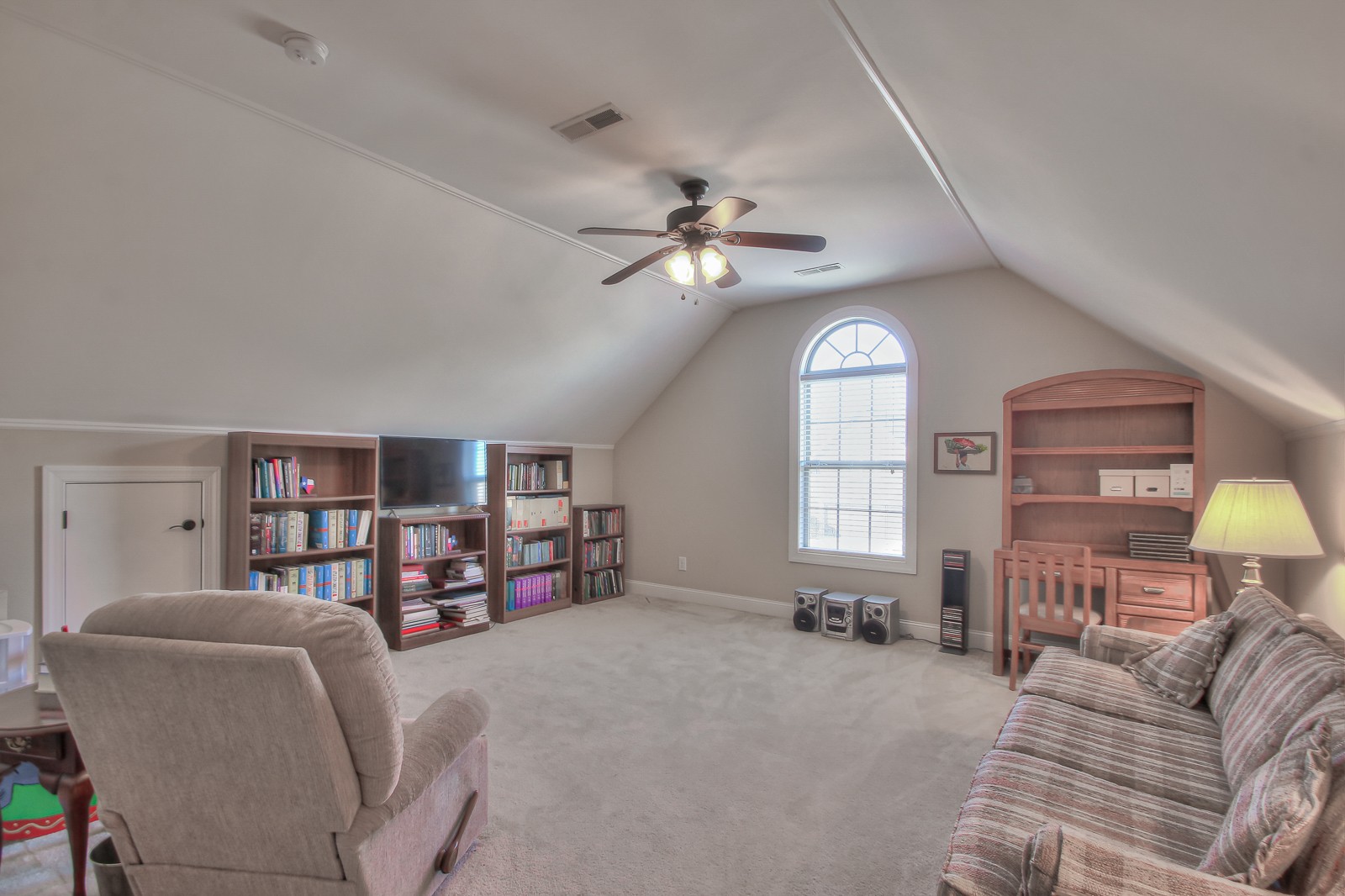 3028 Sakari Circle Spring Hill, TN 37174 - Photo 36 of 46 a living room with furniture and a chandelier