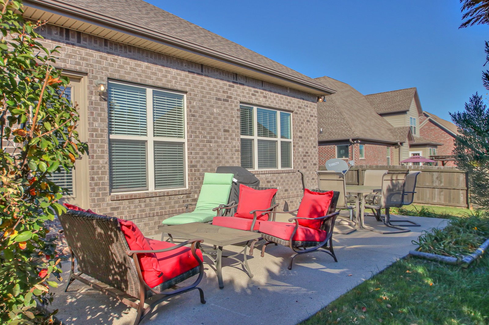3028 Sakari Circle Spring Hill, TN 37174 - Photo 39 of 46 a bench is sitting in front of a house