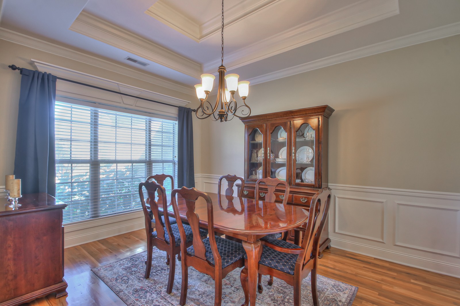 3028 Sakari Circle Spring Hill, TN 37174 - Photo 7 of 46 a view of a dining room with furniture window and wooden floor