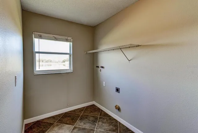 a view of a kitchen and a window