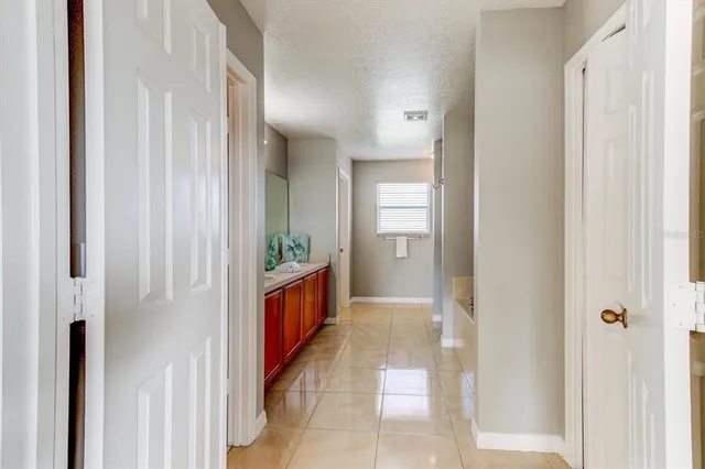 a bathroom with a bathtub and sink
