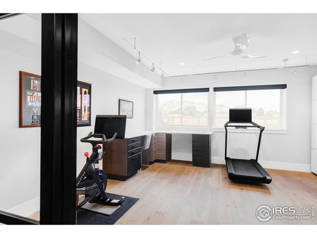 a view of a house with backyard porch and sitting area