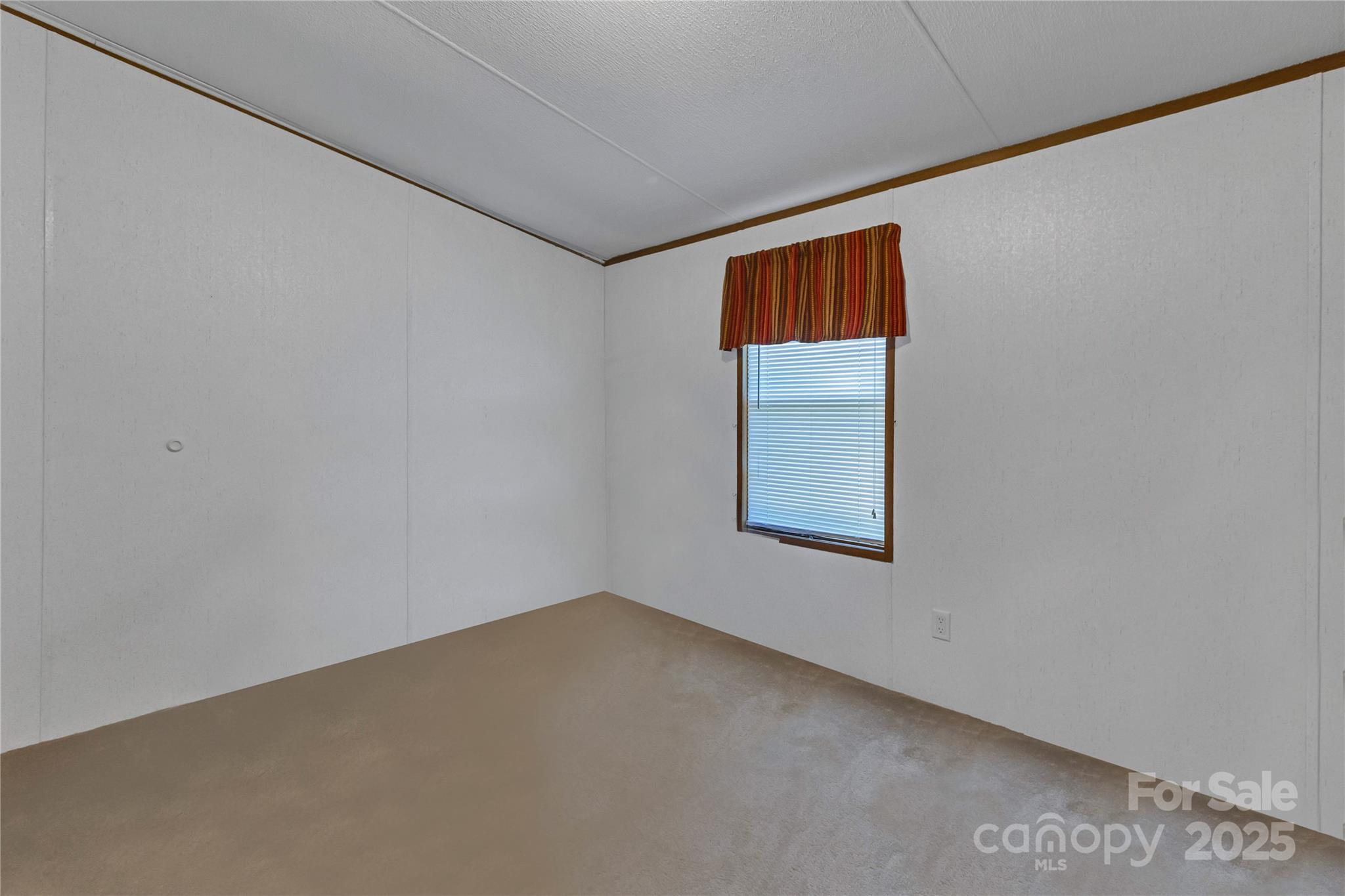 43 Goose Creek Road Swannanoa, NC 28778 - Photo 17 of 25 an empty room with windows