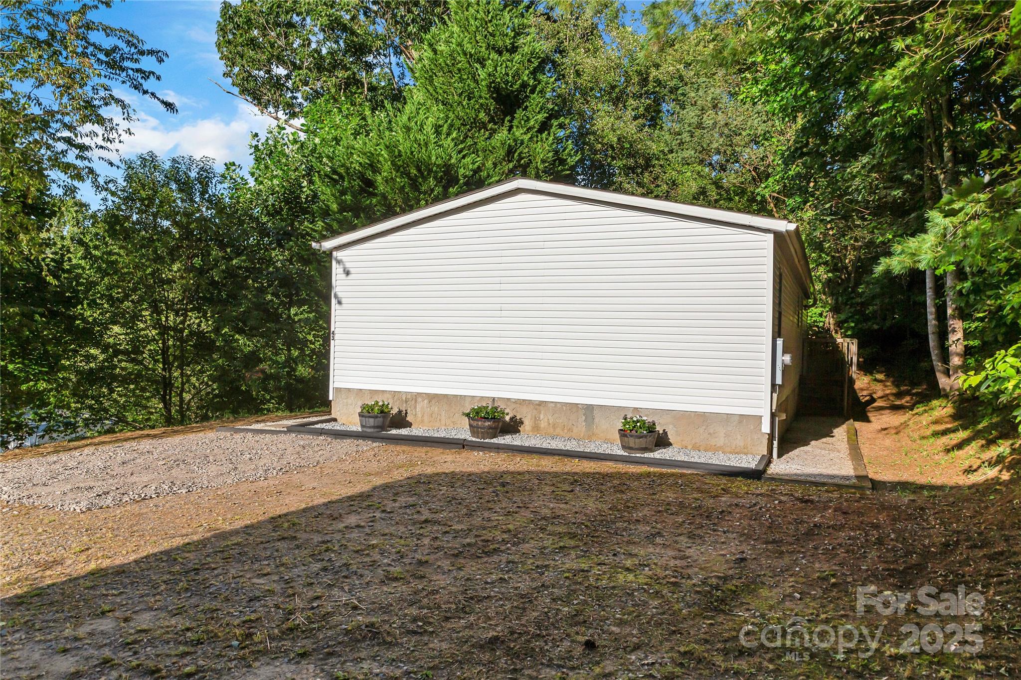 43 Goose Creek Road Swannanoa, NC 28778 - Photo 4 of 25 a view of a house with a yard