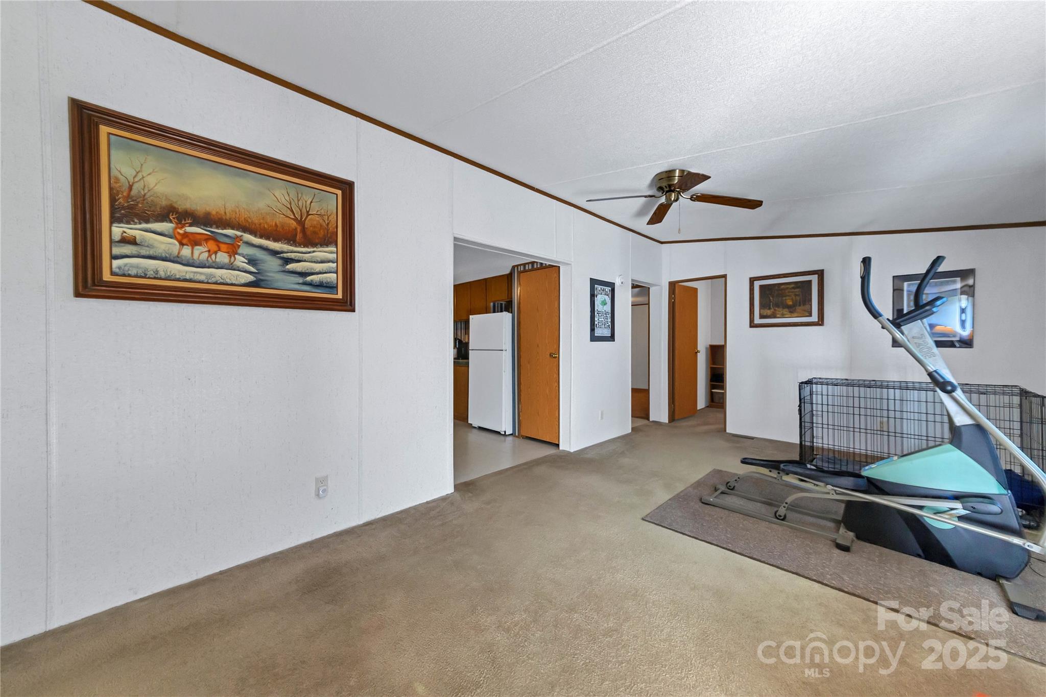 43 Goose Creek Road Swannanoa, NC 28778 - Photo 5 of 25 a room with gym equipment and wooden floor