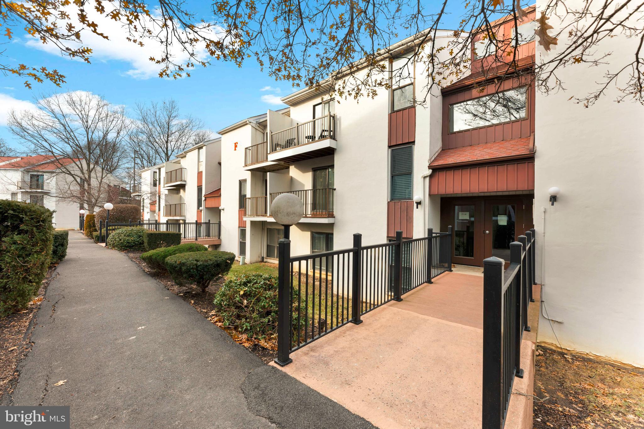 301 Byberry Road, Unit F1 Philadelphia, PA 19116 - Photo 1 of 30 a view of a street with potted plants