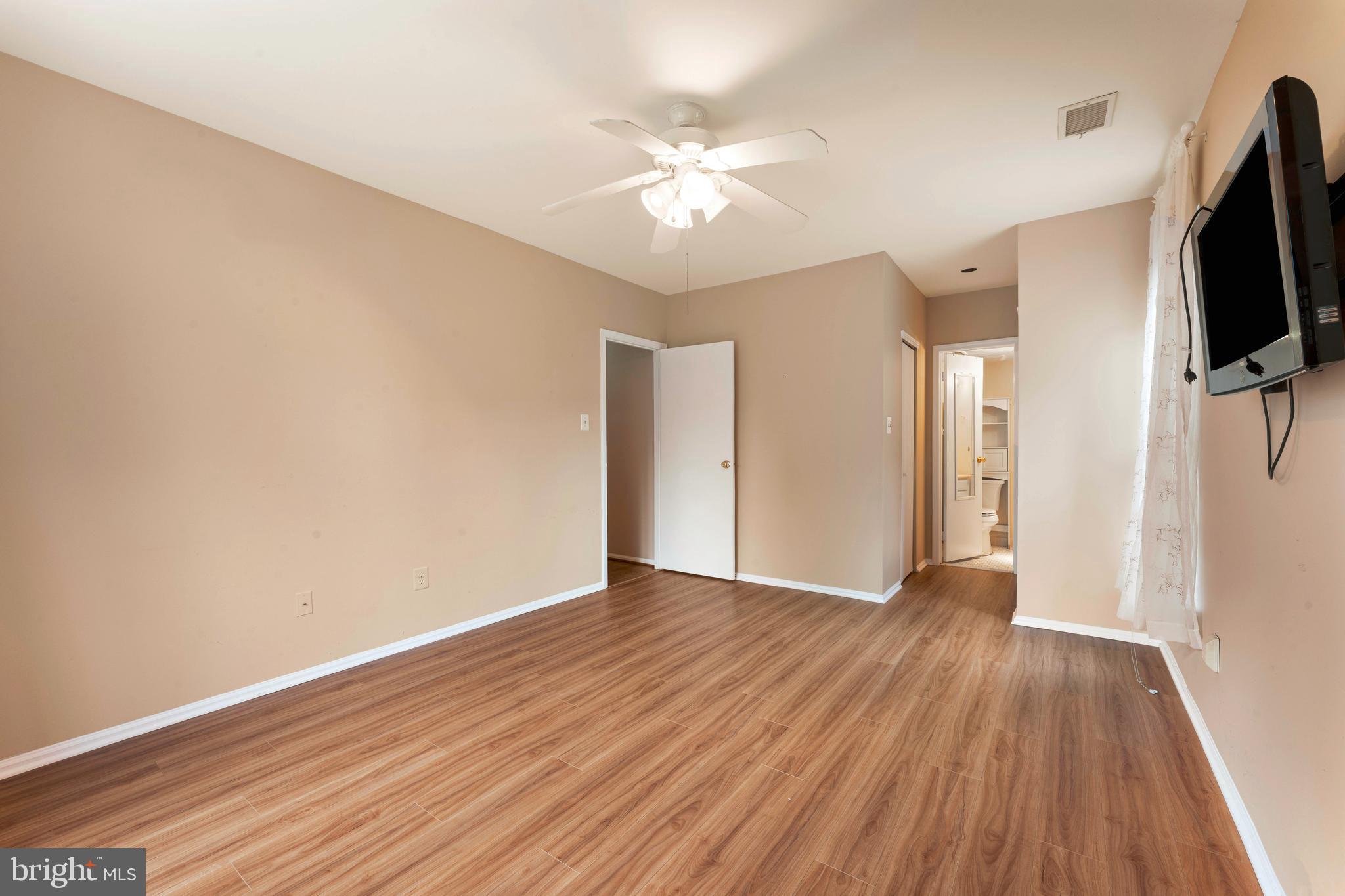 301 Byberry Road, Unit F1 Philadelphia, PA 19116 - Photo 18 of 30 a view of a livingroom with a flat screen tv