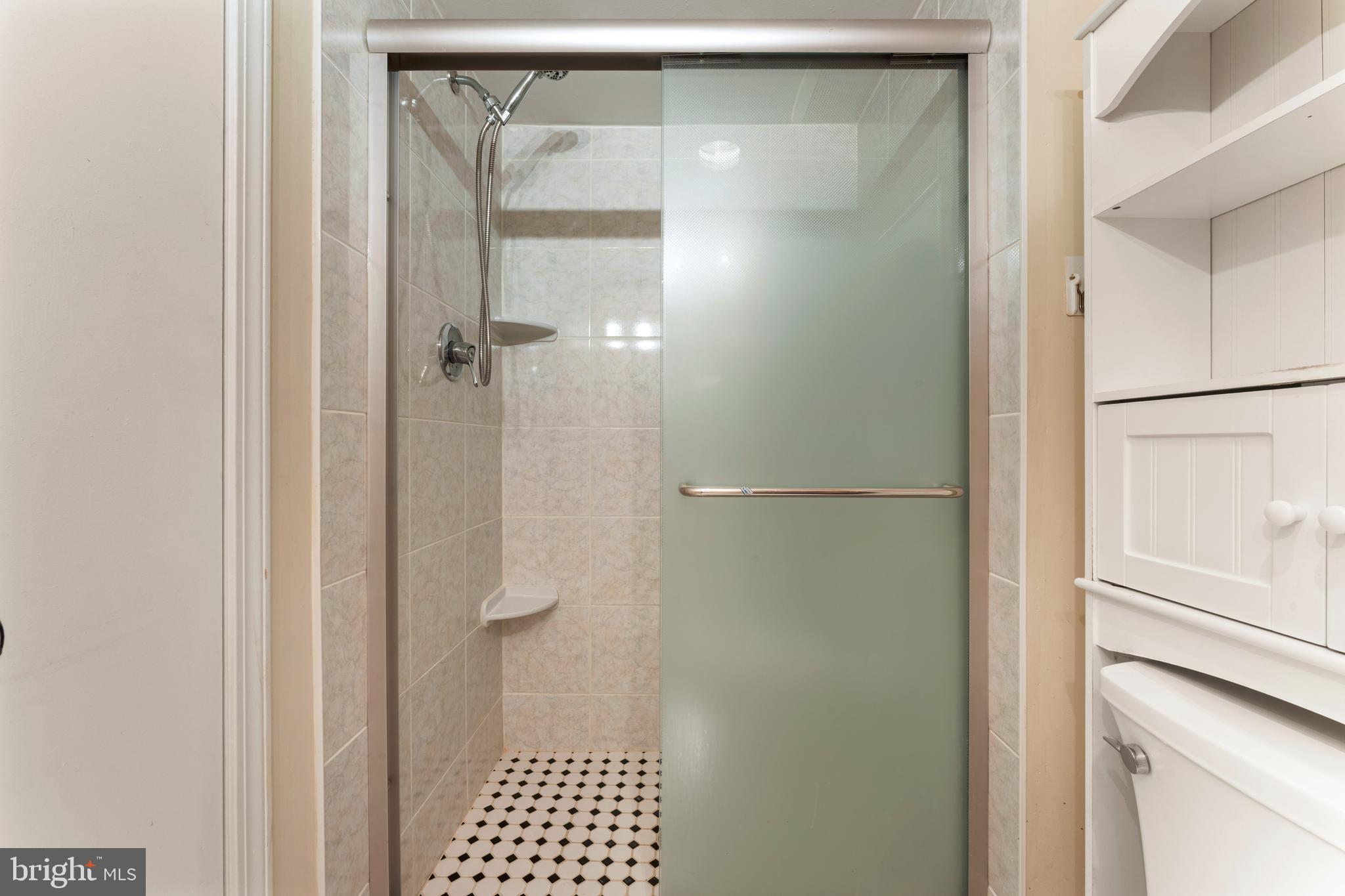 301 Byberry Road, Unit F1 Philadelphia, PA 19116 - Photo 20 of 30 a bathroom with a shower