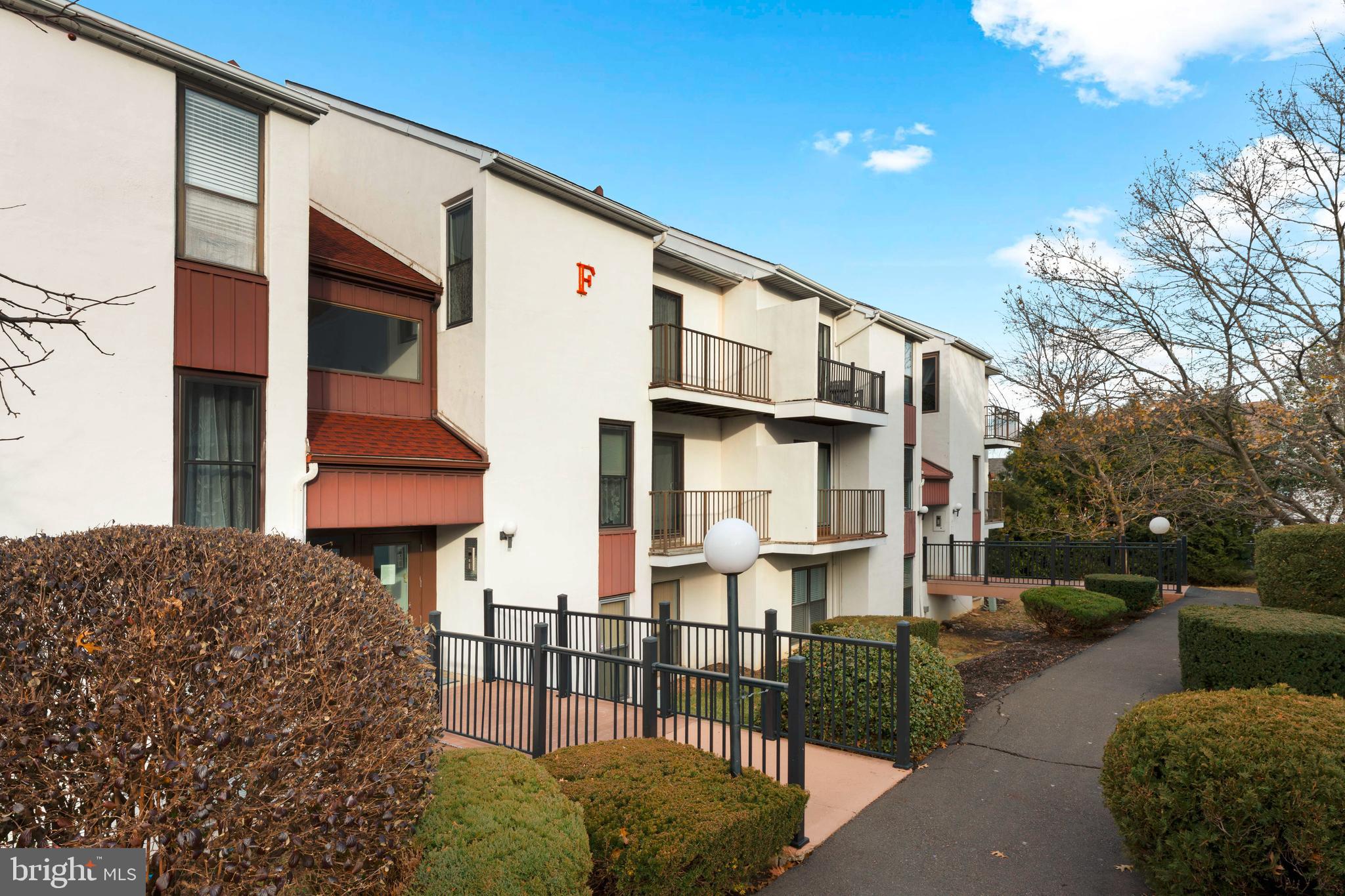 301 Byberry Road, Unit F1 Philadelphia, PA 19116 - Photo 2 of 30 a view of a street with sitting area
