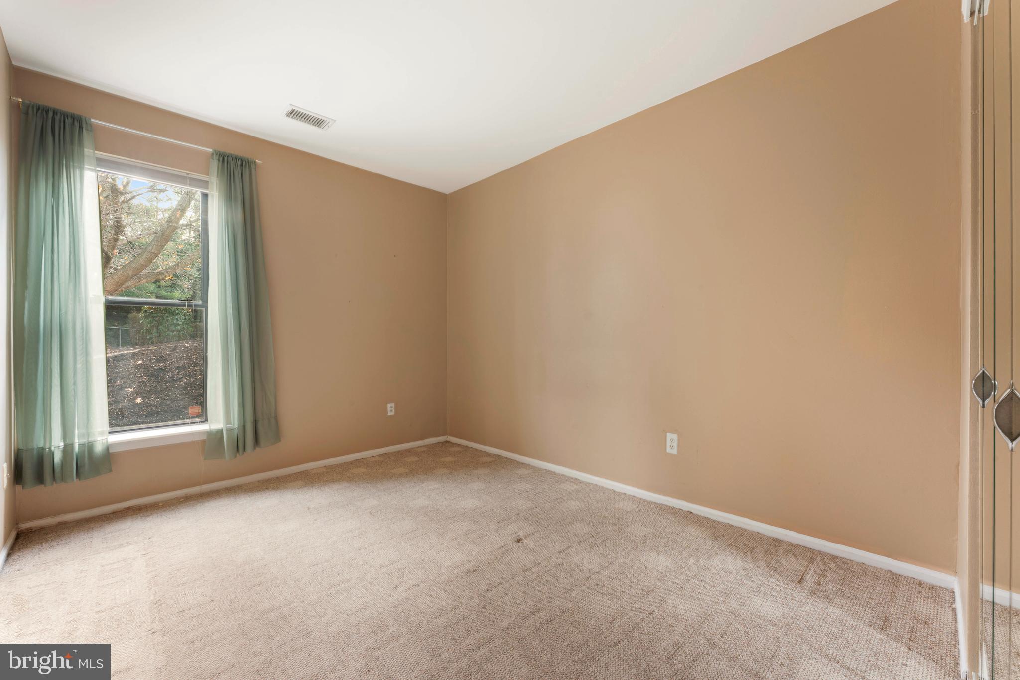301 Byberry Road, Unit F1 Philadelphia, PA 19116 - Photo 21 of 30 a view of an empty room with a window