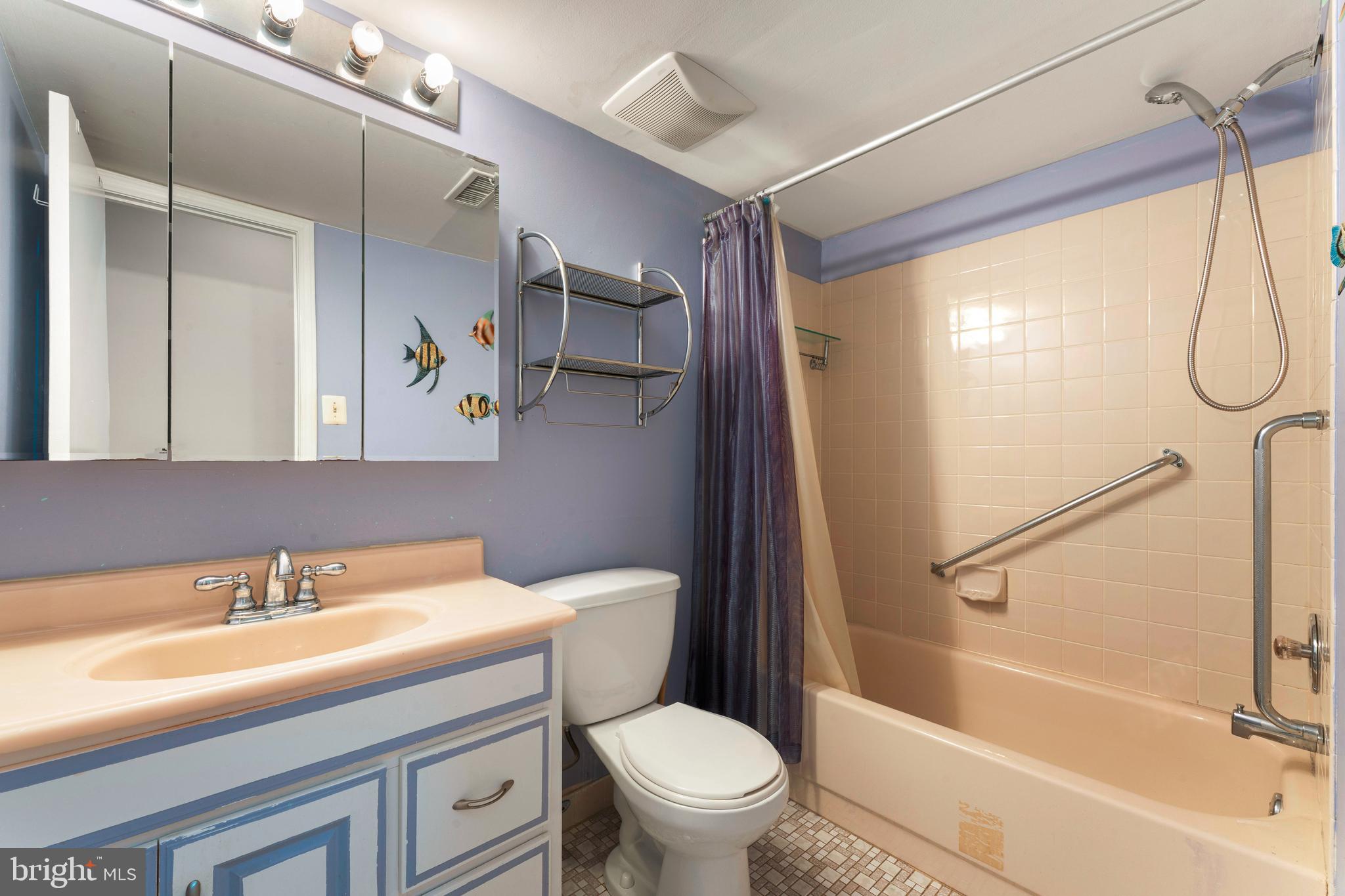 301 Byberry Road, Unit F1 Philadelphia, PA 19116 - Photo 23 of 30 a bathroom with a sink toilet and shower