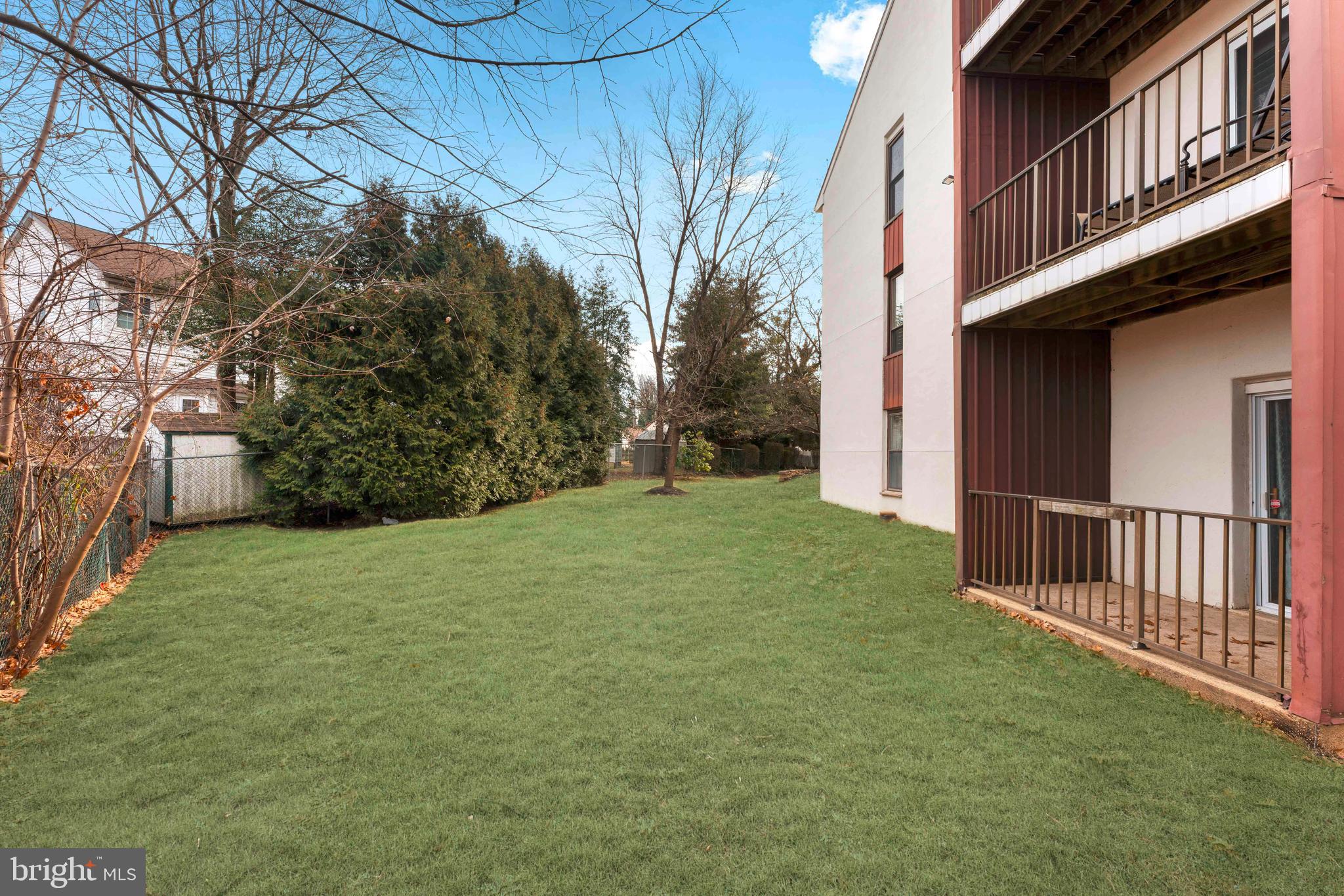 301 Byberry Road, Unit F1 Philadelphia, PA 19116 - Photo 27 of 30 a view of a house with a yard