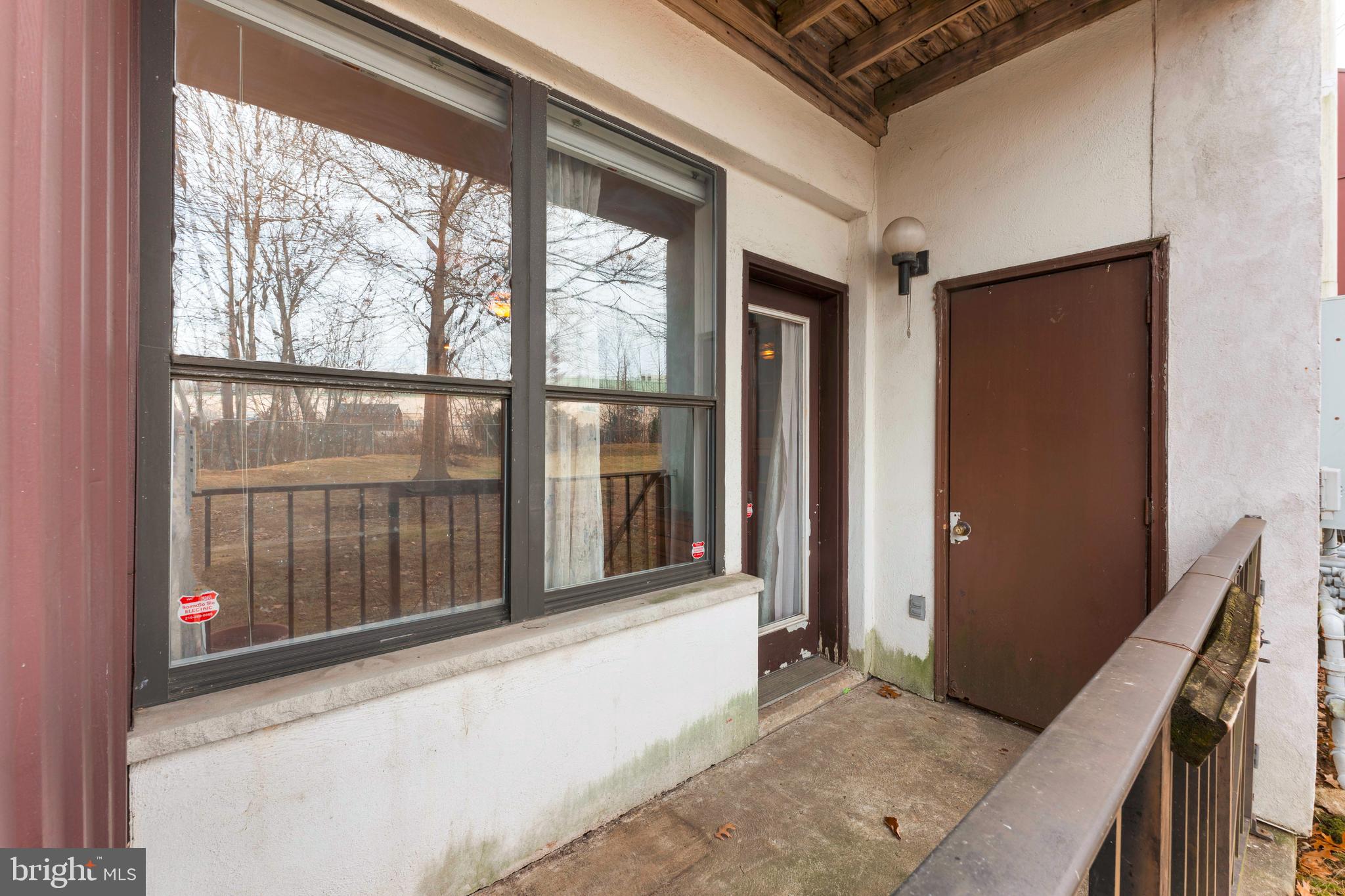 301 Byberry Road, Unit F1 Philadelphia, PA 19116 - Photo 29 of 30 a view of a hallway with windows