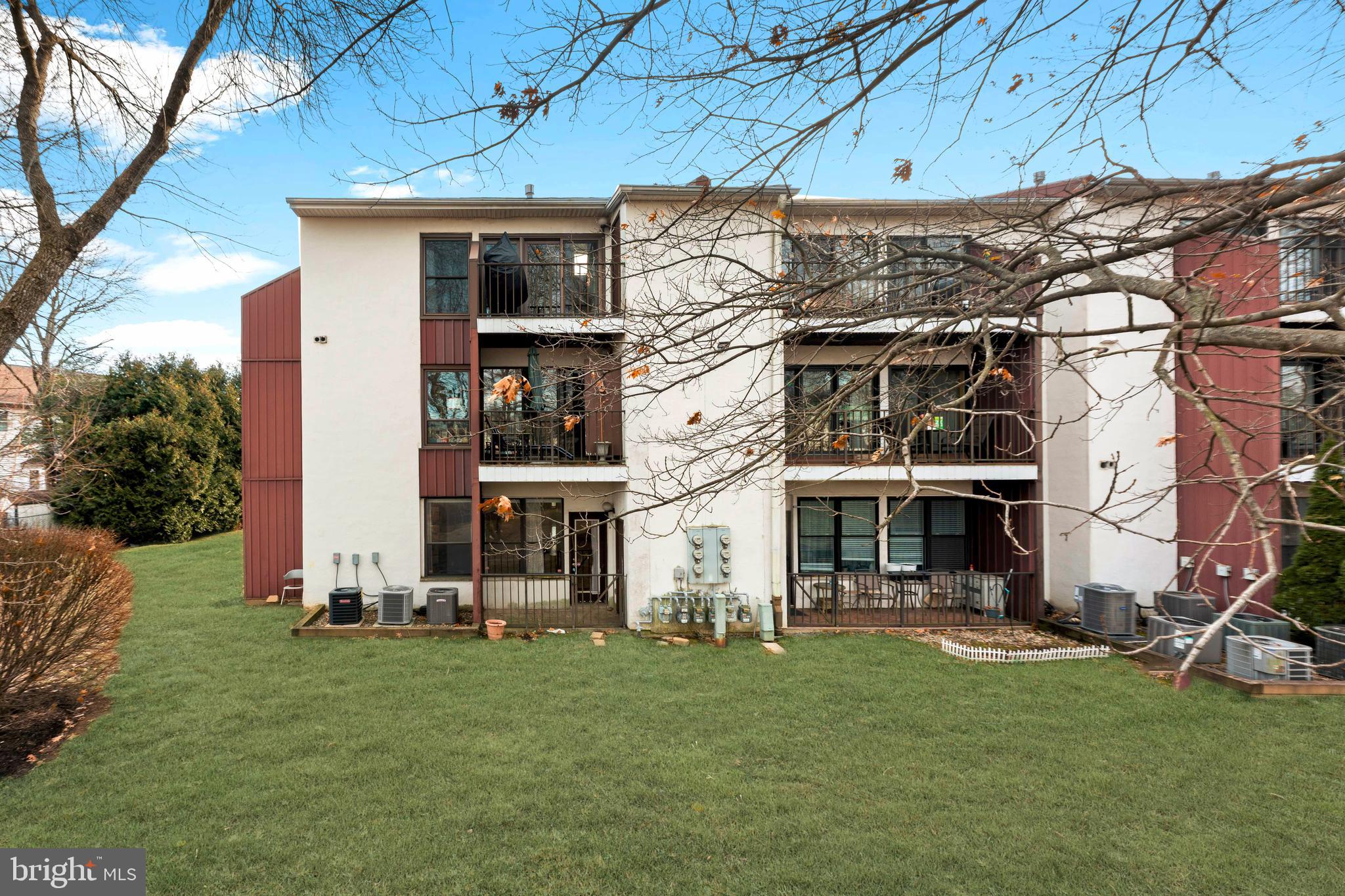 301 Byberry Road, Unit F1 Philadelphia, PA 19116 - Photo 3 of 30 a view of a house with a yard