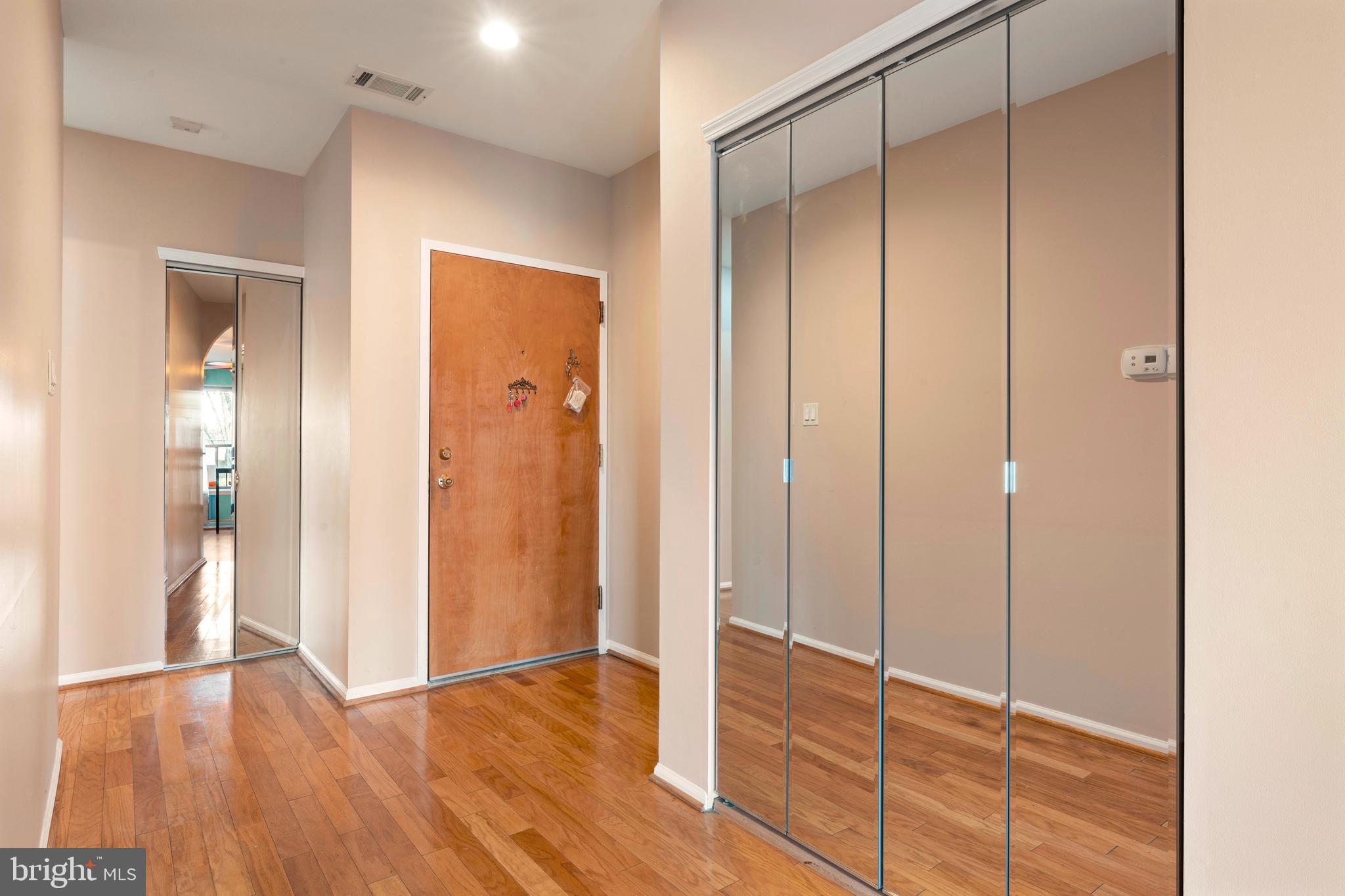 301 Byberry Road, Unit F1 Philadelphia, PA 19116 - Photo 4 of 30 a view of entryway with wooden floor