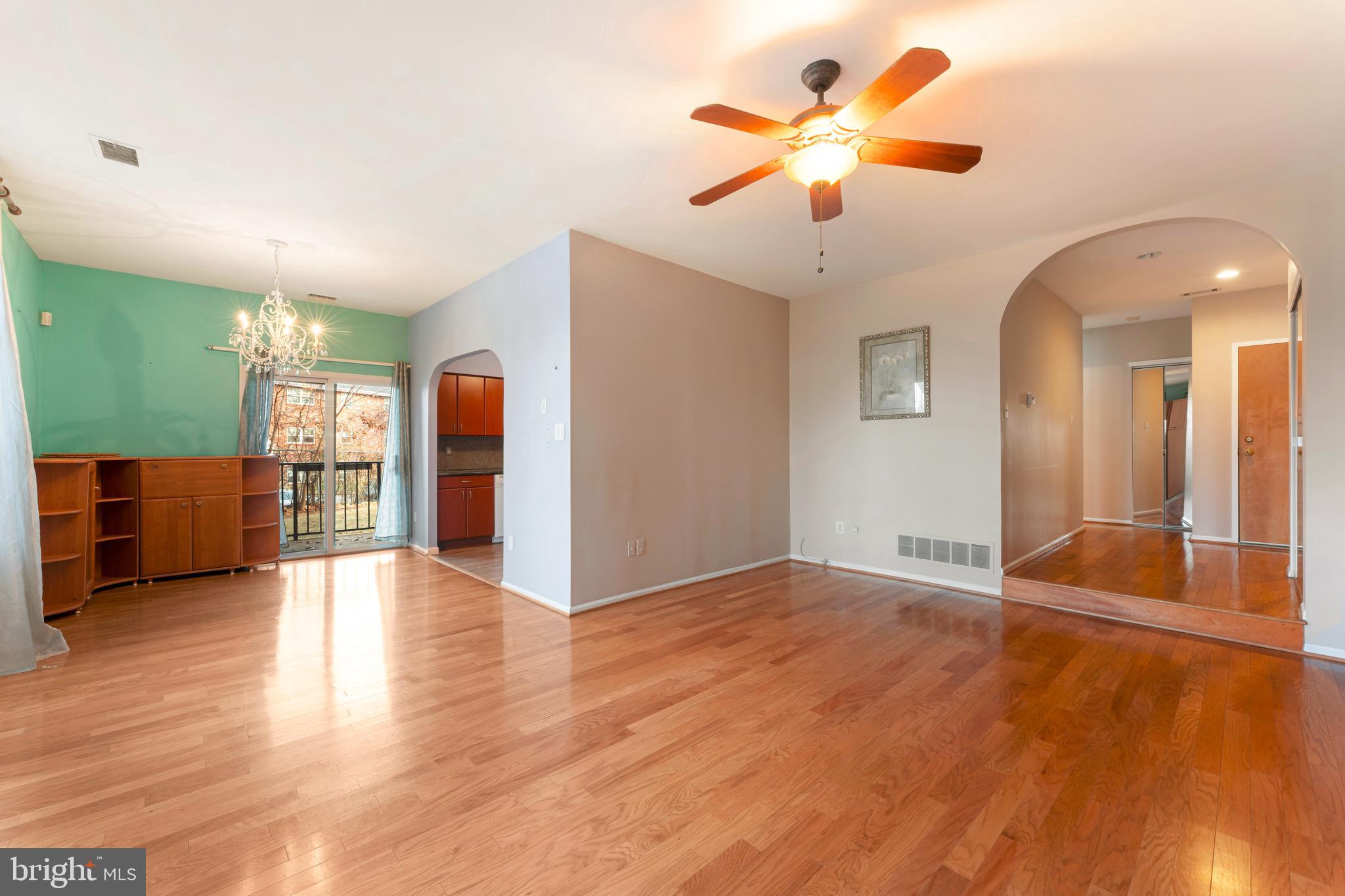 301 Byberry Road, Unit F1 Philadelphia, PA 19116 - Photo 9 of 30 wooden floor in an empty room with a window