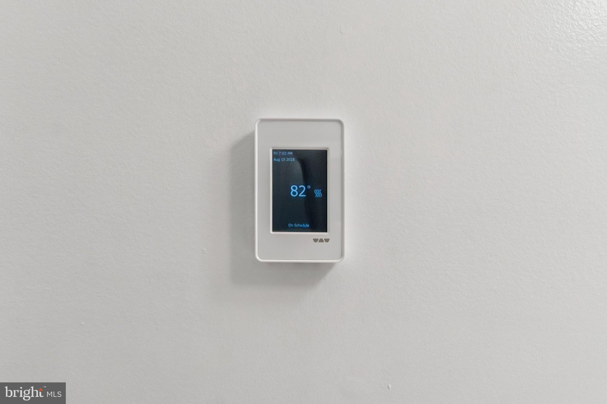 3437 Summit Court Northeast, Unit 3437 Washington, DC 20018 - Photo 20 of 26 a white building with a window