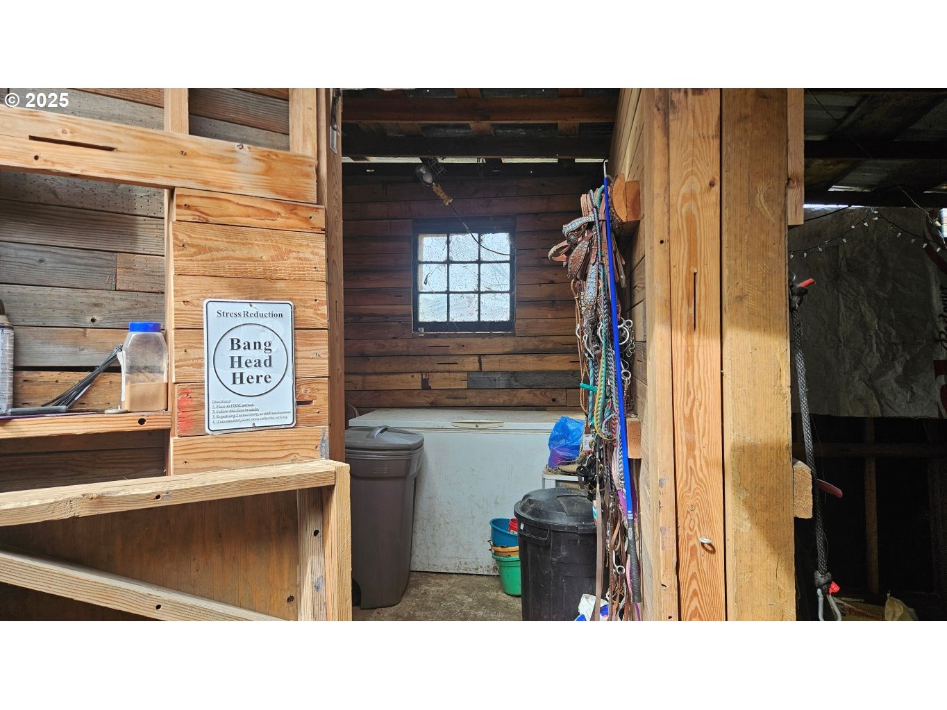 73715 Indian Creek Road Imnaha, OR 97842 - Photo 12 of 18 a black and white photo of a living room