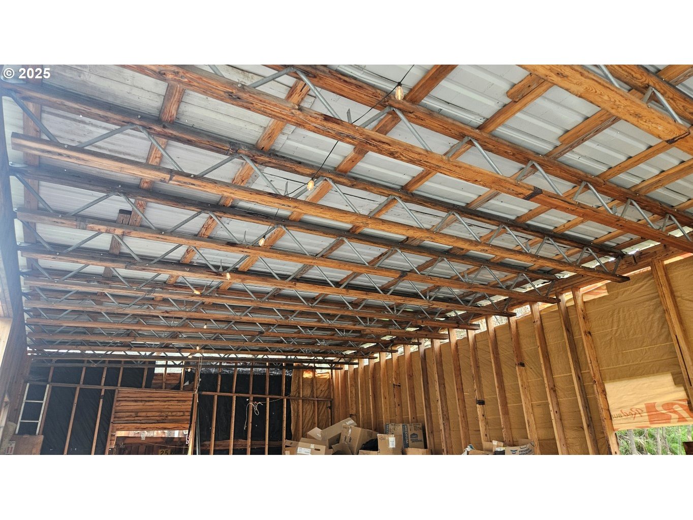 73715 Indian Creek Road Imnaha, OR 97842 - Photo 13 of 18 a black and white photo of a man