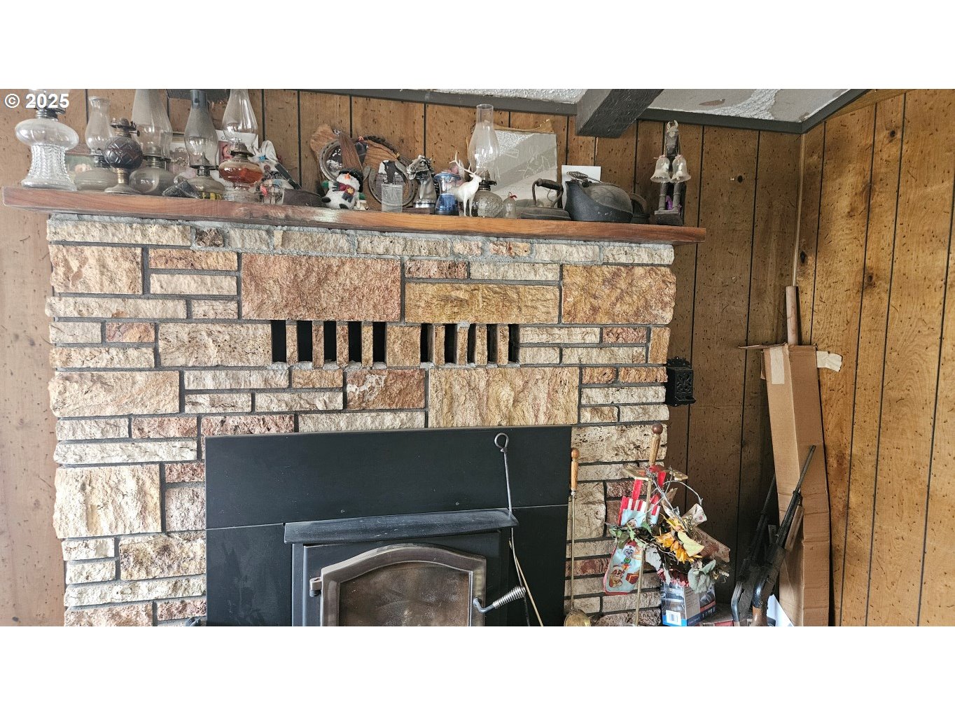 73715 Indian Creek Road Imnaha, OR 97842 - Photo 3 of 18 a black and white photo of a fireplace