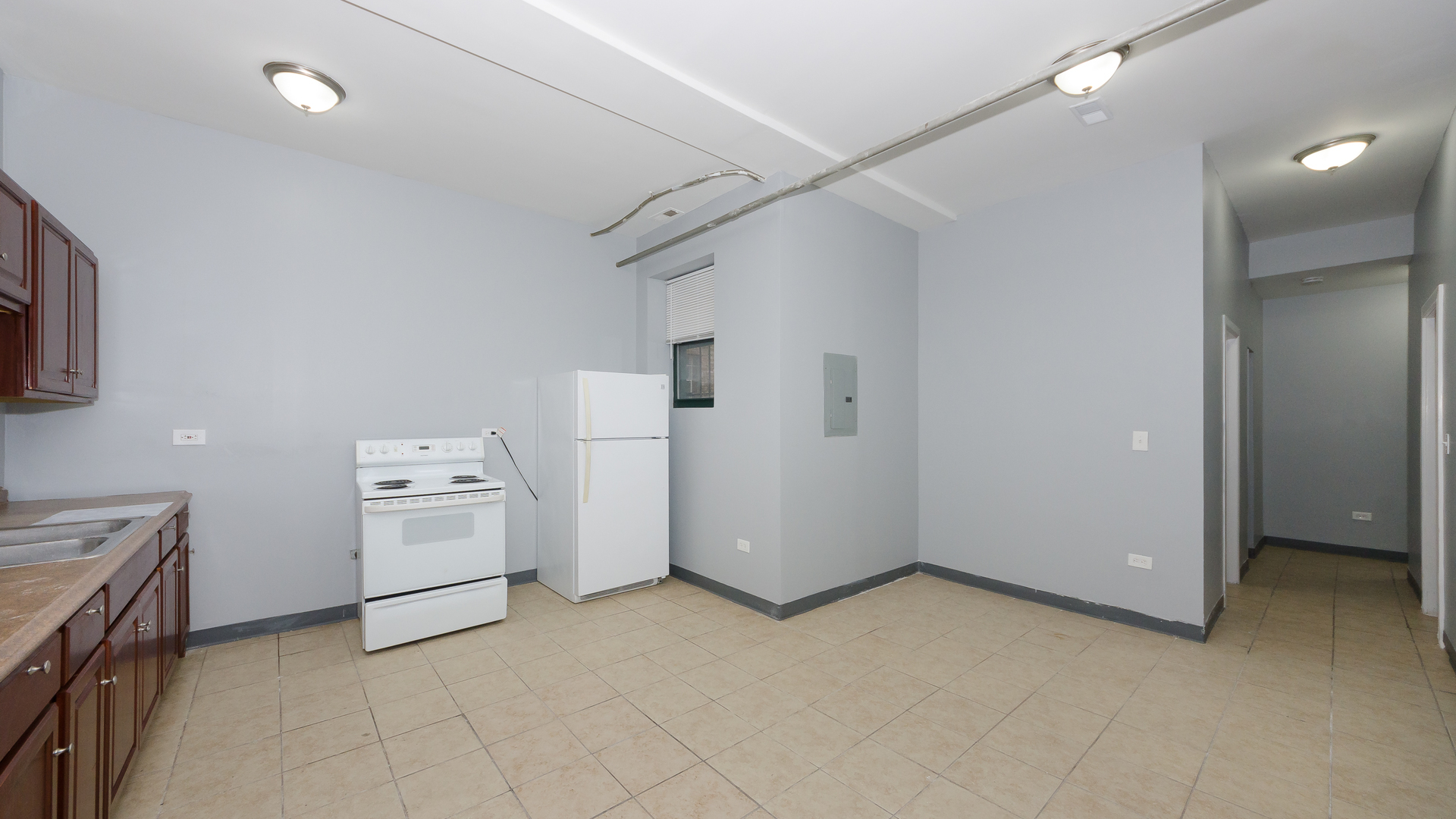 2211 East 69th Street, Unit G Chicago, IL 60649 - Photo 6 of 9 a view of utility room with racks