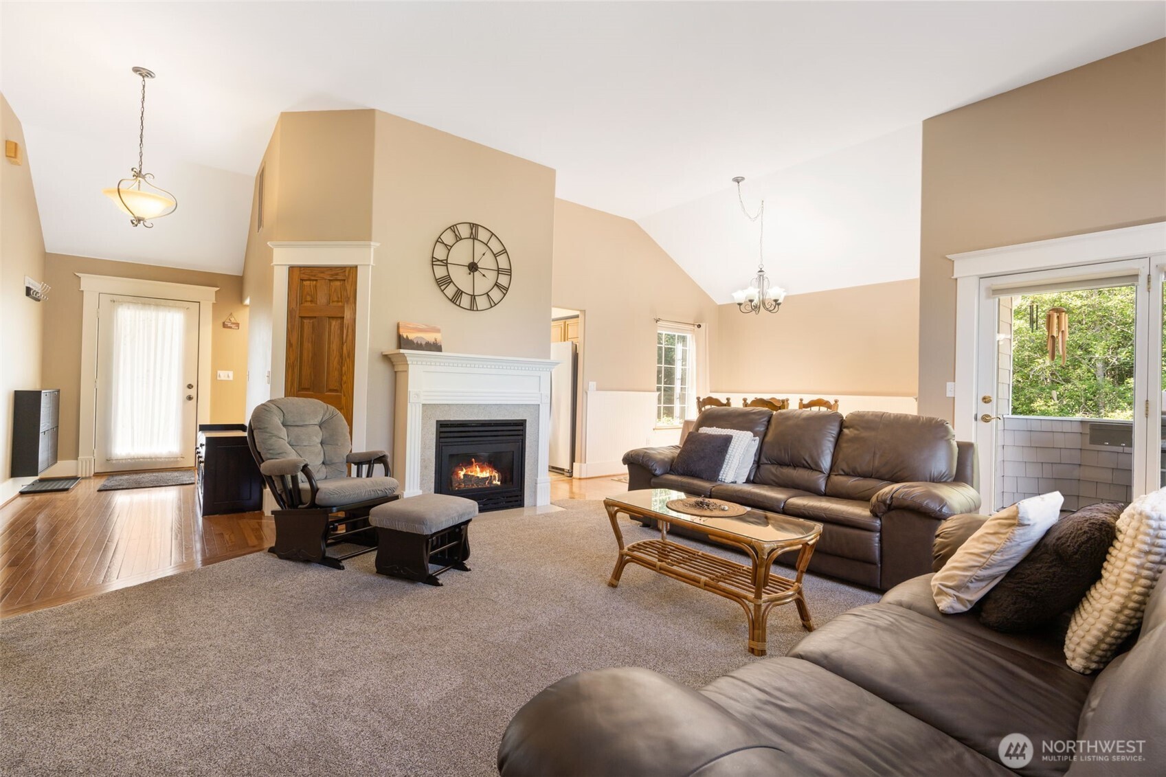 308 Brockway Road Chehalis, WA 98532 - Photo 7 of 40 a living room with furniture a large window and a fireplace