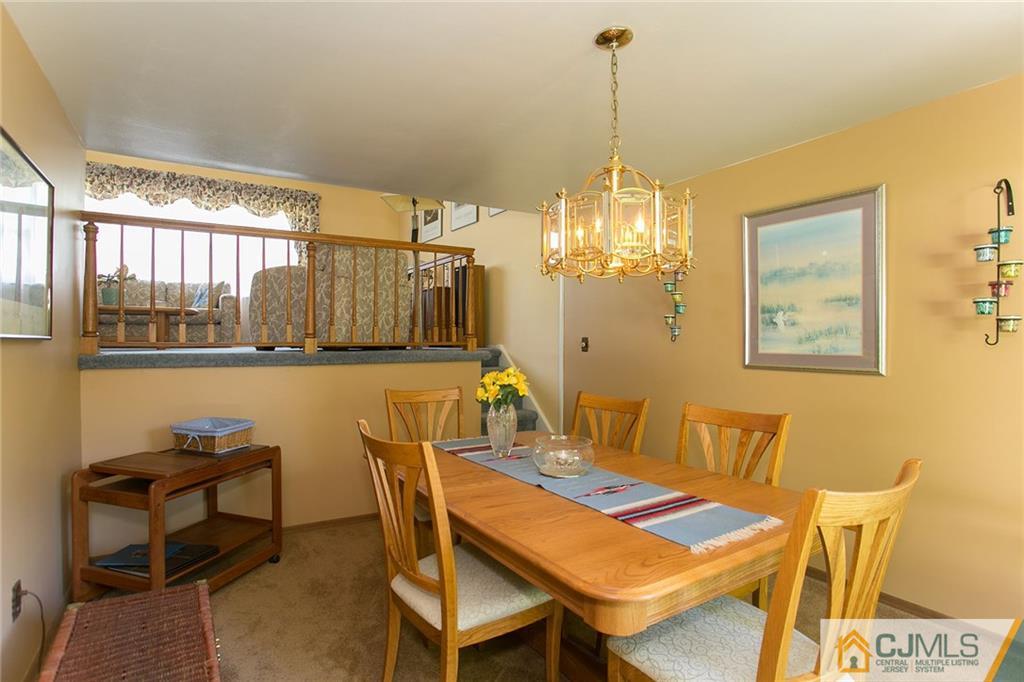 28 Timber Road Edison, NJ 08820 - Photo 11 of 23 a dining room with furniture and window