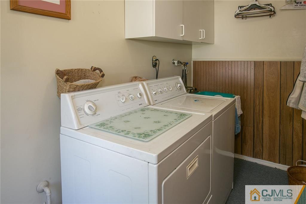 28 Timber Road Edison, NJ 08820 - Photo 16 of 23 a utility room with dryer and washer
