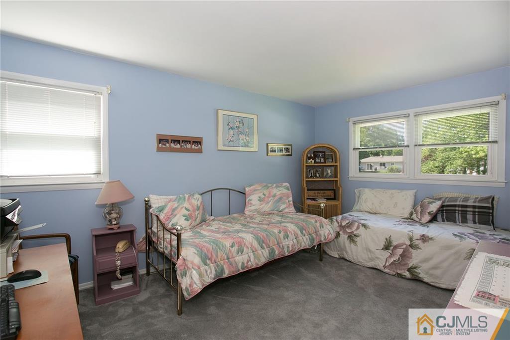 28 Timber Road Edison, NJ 08820 - Photo 22 of 23 a bedroom with two beds and a window