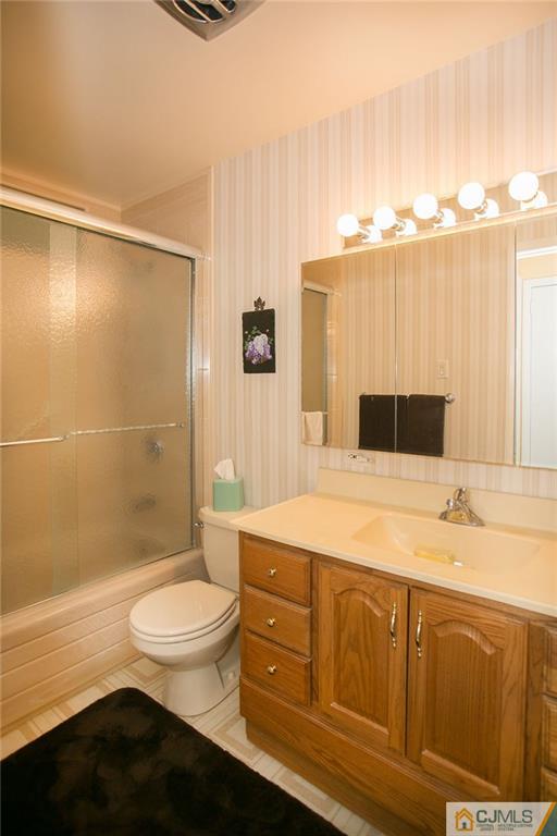 28 Timber Road Edison, NJ 08820 - Photo 23 of 23 a bathroom with a granite countertop sink toilet and shower