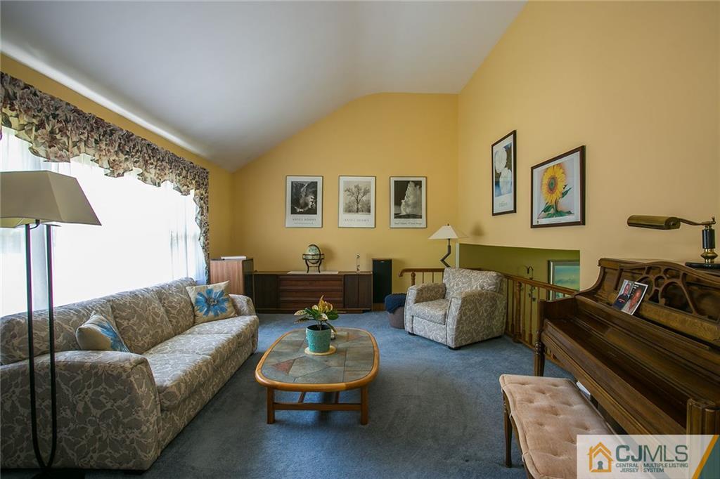 28 Timber Road Edison, NJ 08820 - Photo 7 of 23 a living room with furniture and a couch