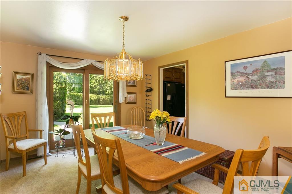 28 Timber Road Edison, NJ 08820 - Photo 10 of 23 a view of a dining room with furniture window and outside view