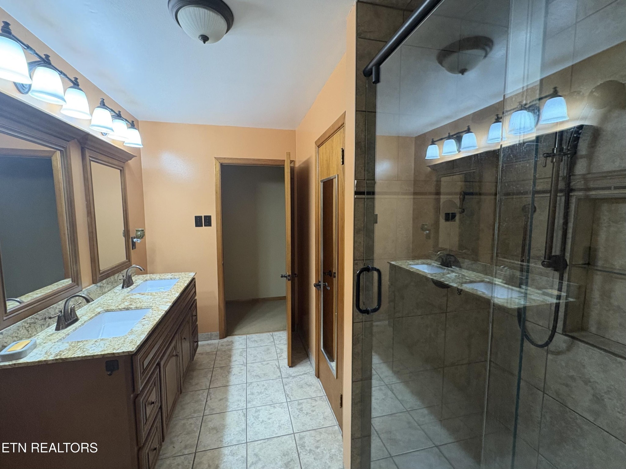 1907 Tazewell Pike Corryton, TN 37721 - Photo 24 of 42 a bathroom with a sink a toilet and shower