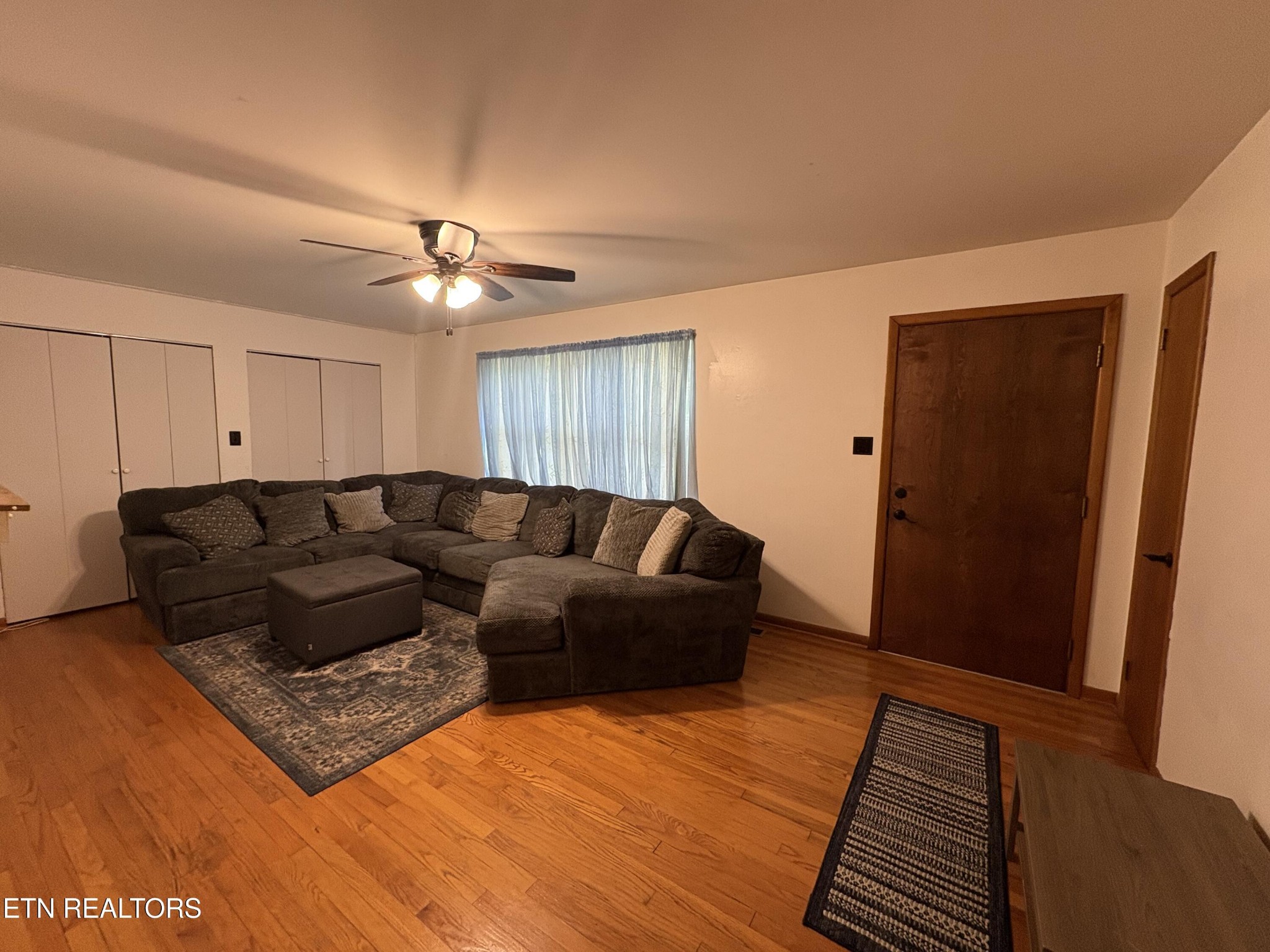 1907 Tazewell Pike Corryton, TN 37721 - Photo 27 of 42 a living room with furniture and a rug
