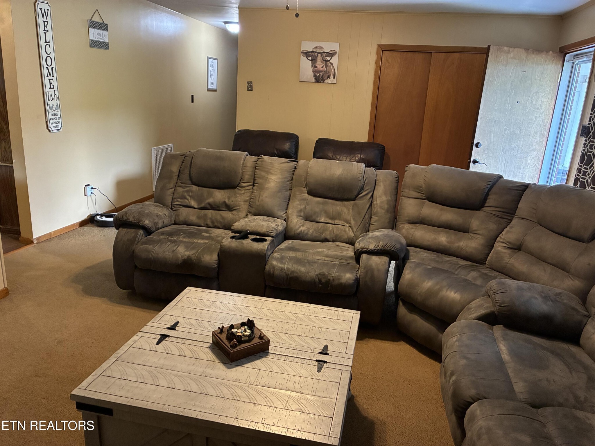 1907 Tazewell Pike Corryton, TN 37721 - Photo 29 of 42 a living room with furniture and a wooden floor