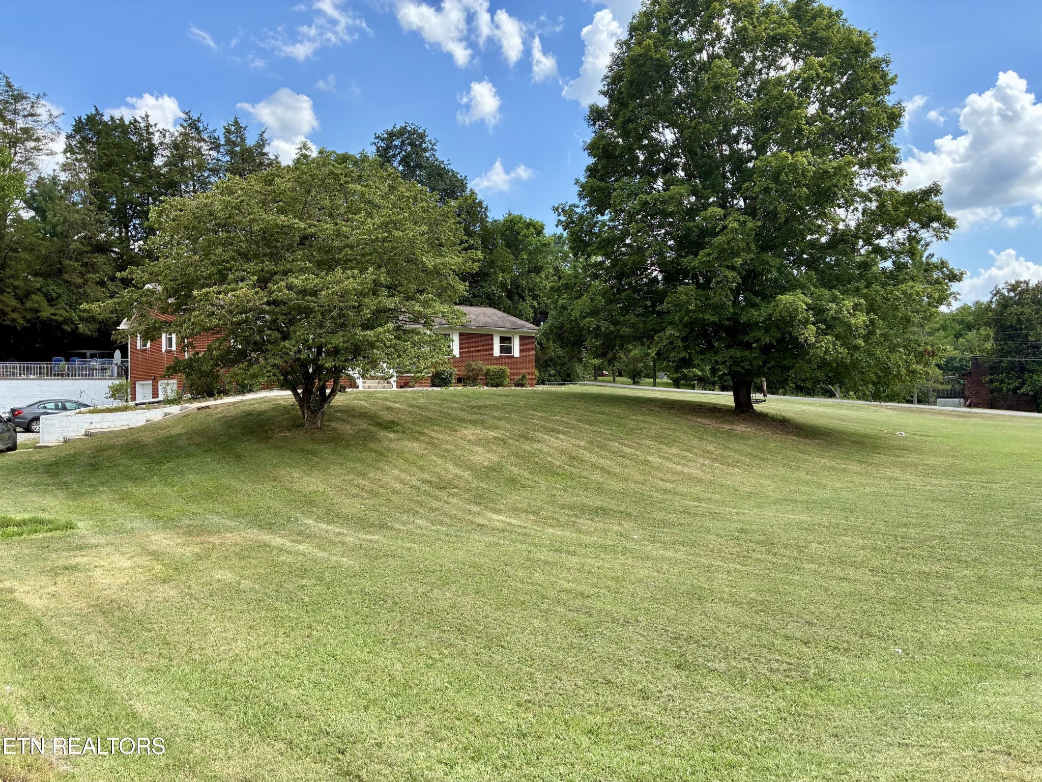 1907 Tazewell Pike Corryton, TN 37721 - Photo 39 of 42 a view of a water fountain and a bench