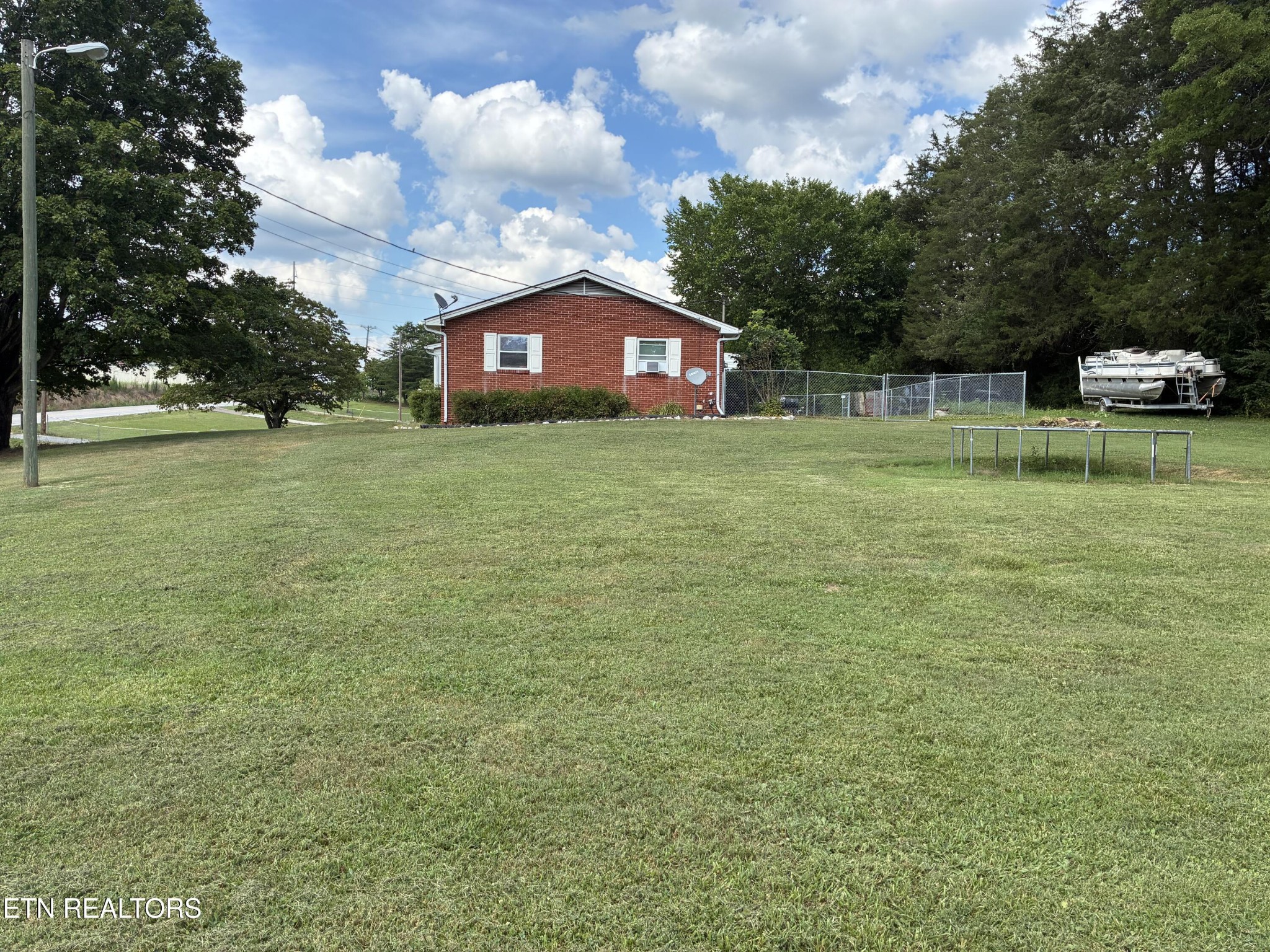 1907 Tazewell Pike Corryton, TN 37721 - Photo 8 of 42 a view of a house with a yard