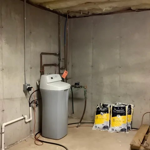 a storage room with washer and dryer