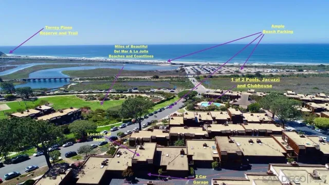 a view of a city with an ocean view