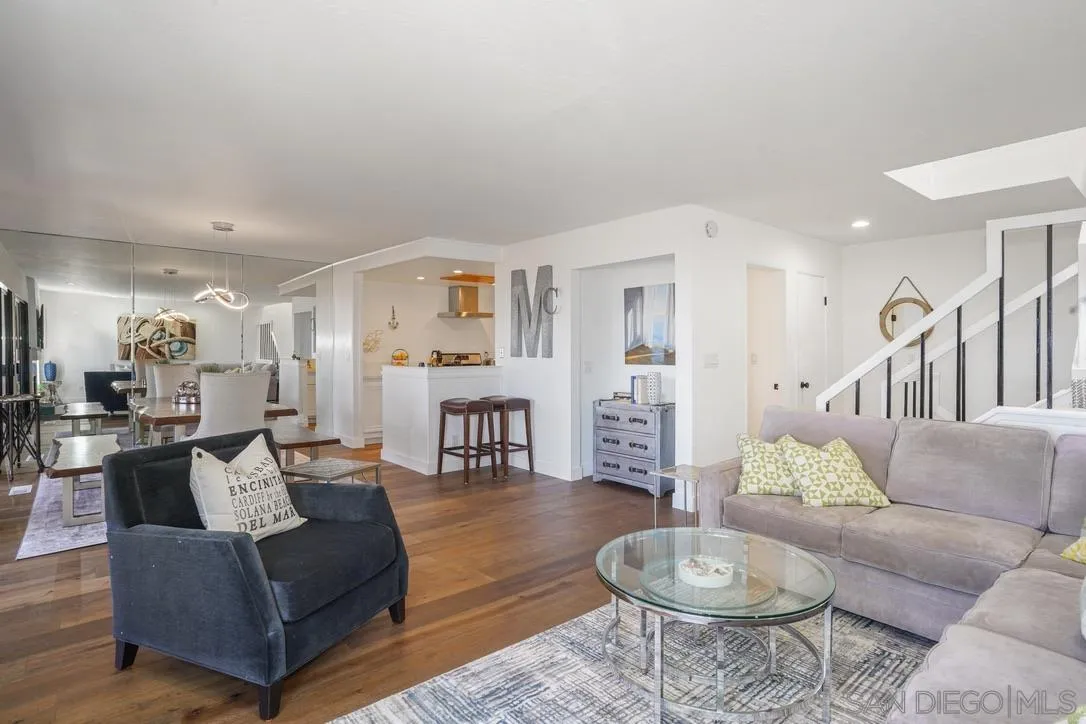 13053 Caminito Del Rocio Del Mar, CA 92014 - Photo 10 of 49 a living room with furniture and a wooden floor