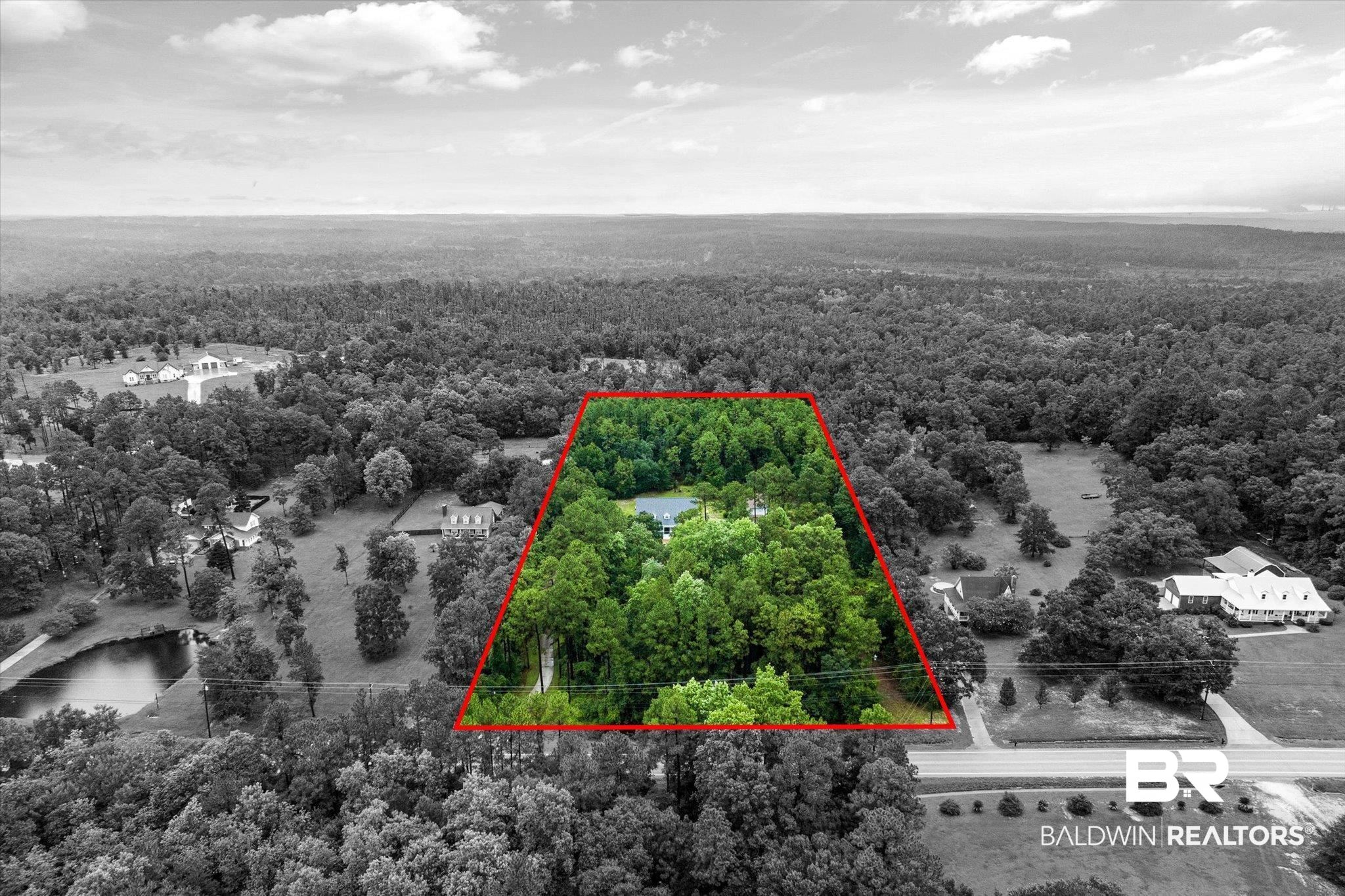 2300 Radcliff Road Saraland, AL 36571 - Photo 45 of 56 Aerial overview of property's location featuring a heavily wooded area and property boundaries highlighted
