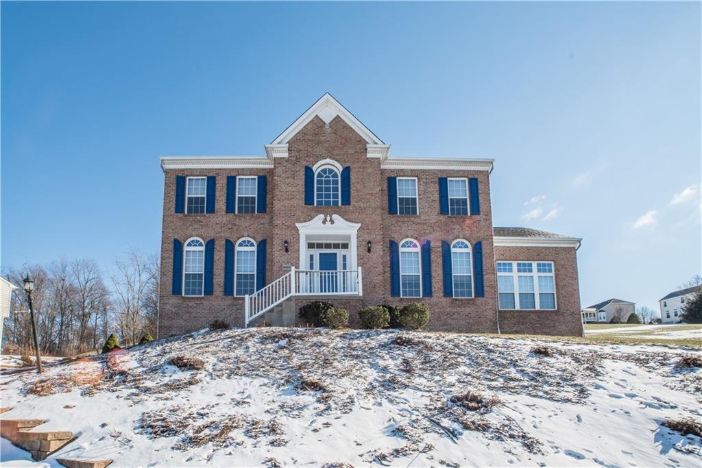 8404 David Drive Bridgeville, PA 15017 - Photo 1 of 25 a front view of a house with a yard