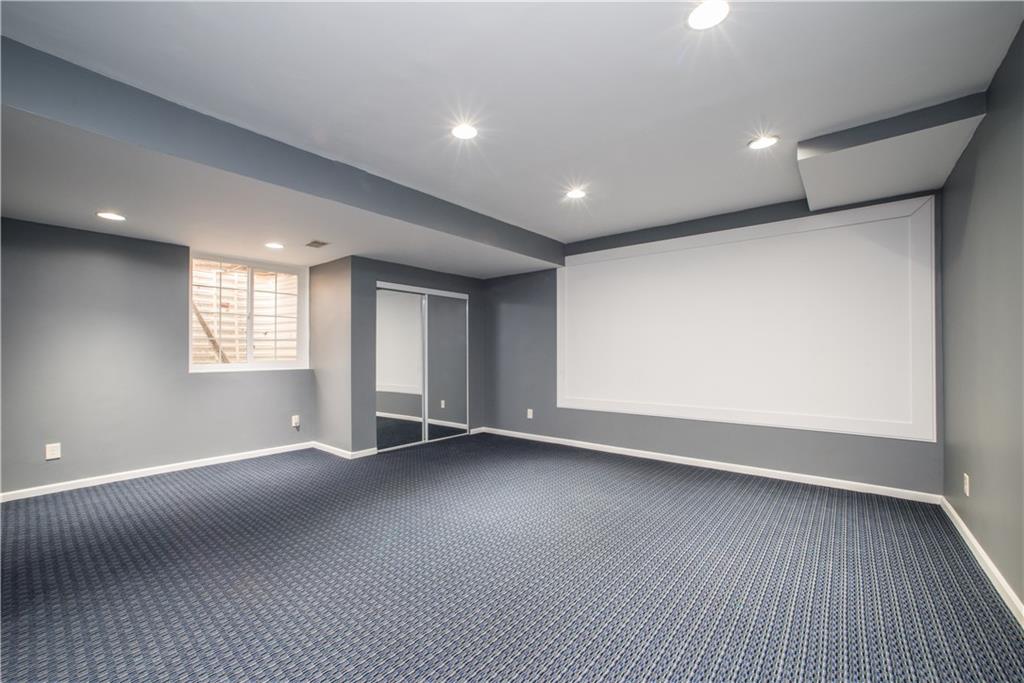 8404 David Drive Bridgeville, PA 15017 - Photo 19 of 25 an empty room with wooden floor and windows