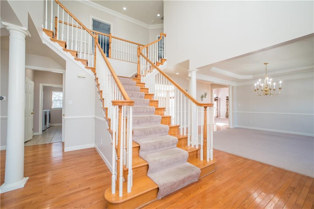 8404 David Drive Bridgeville, PA 15017 - Photo 2 of 25 a view of entryway and hall with wooden floor