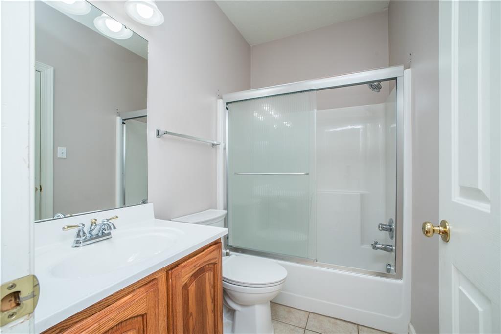 8404 David Drive Bridgeville, PA 15017 - Photo 21 of 25 a bathroom with a sink a toilet and shower