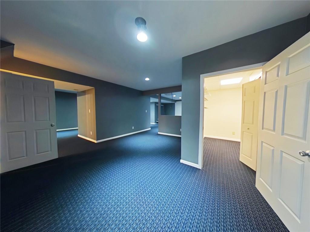 8404 David Drive Bridgeville, PA 15017 - Photo 24 of 25 a view of empty room with wooden floor and fan