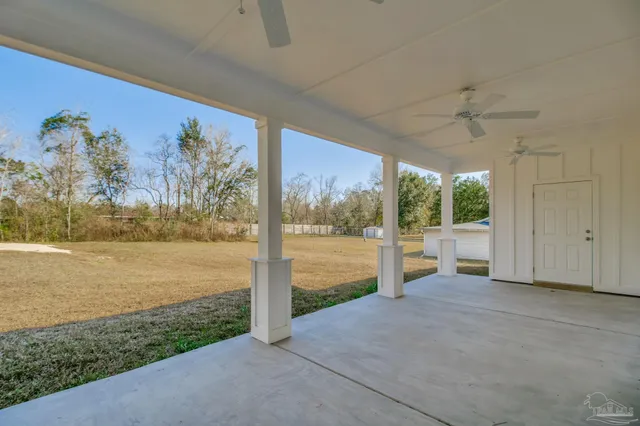 a view of a room with porch and furniture