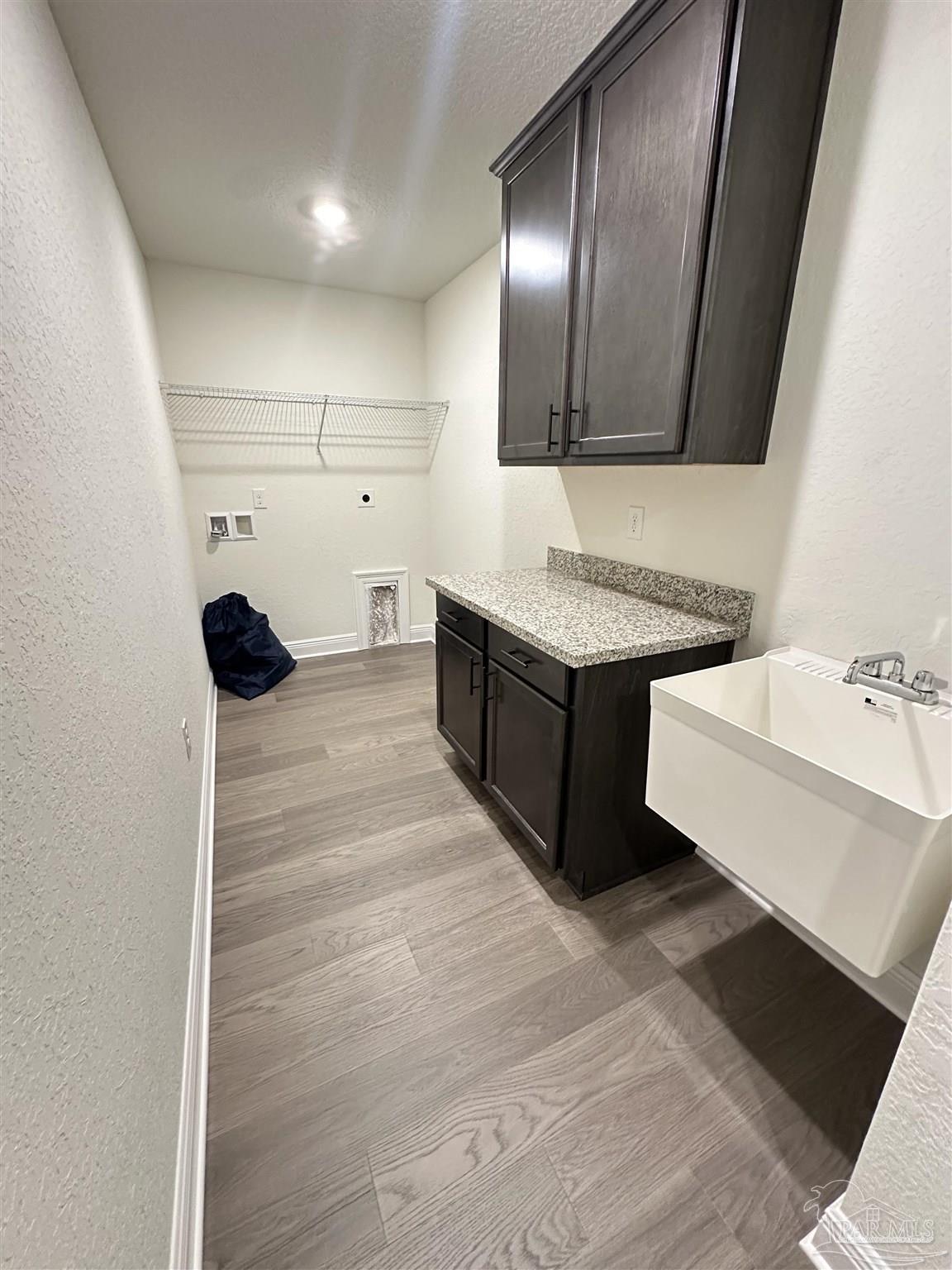 5214 Barnett Road Milton, FL 32583 - Photo 12 of 22 a bathroom with a sink and a mirror